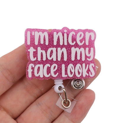 "I’m Nicer Than My Face Looks" Funny Badge Reel — Retractable ID Holder with Alligator Clip